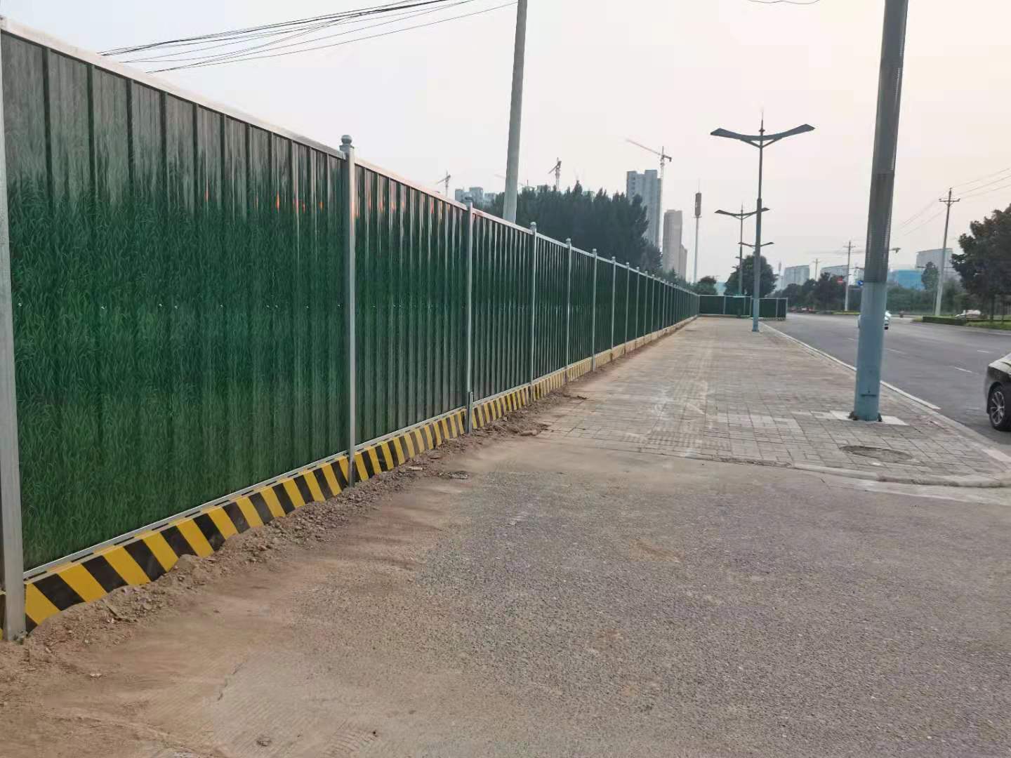 洛阳市洛龙区古城路装置彩钢围挡-amjs澳金沙门线路首页实业洛阳围挡厂家